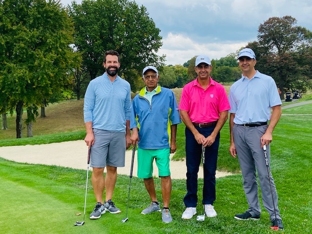 The second place foursome of Hal Chaudhary MD Riaz Chaudhary MD Salem Chaudhary and Andy Law.